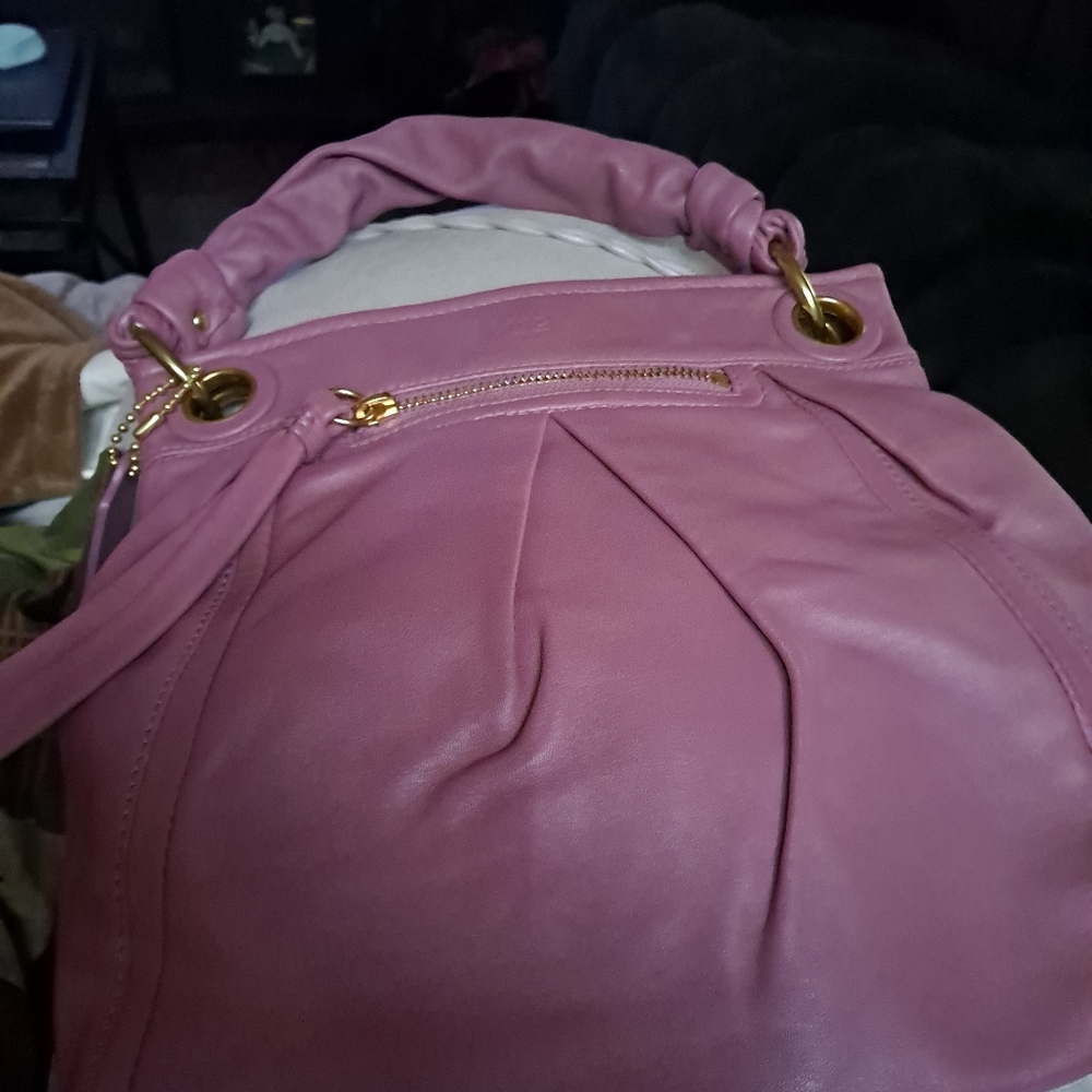 Very Gently used leather Coach Parker